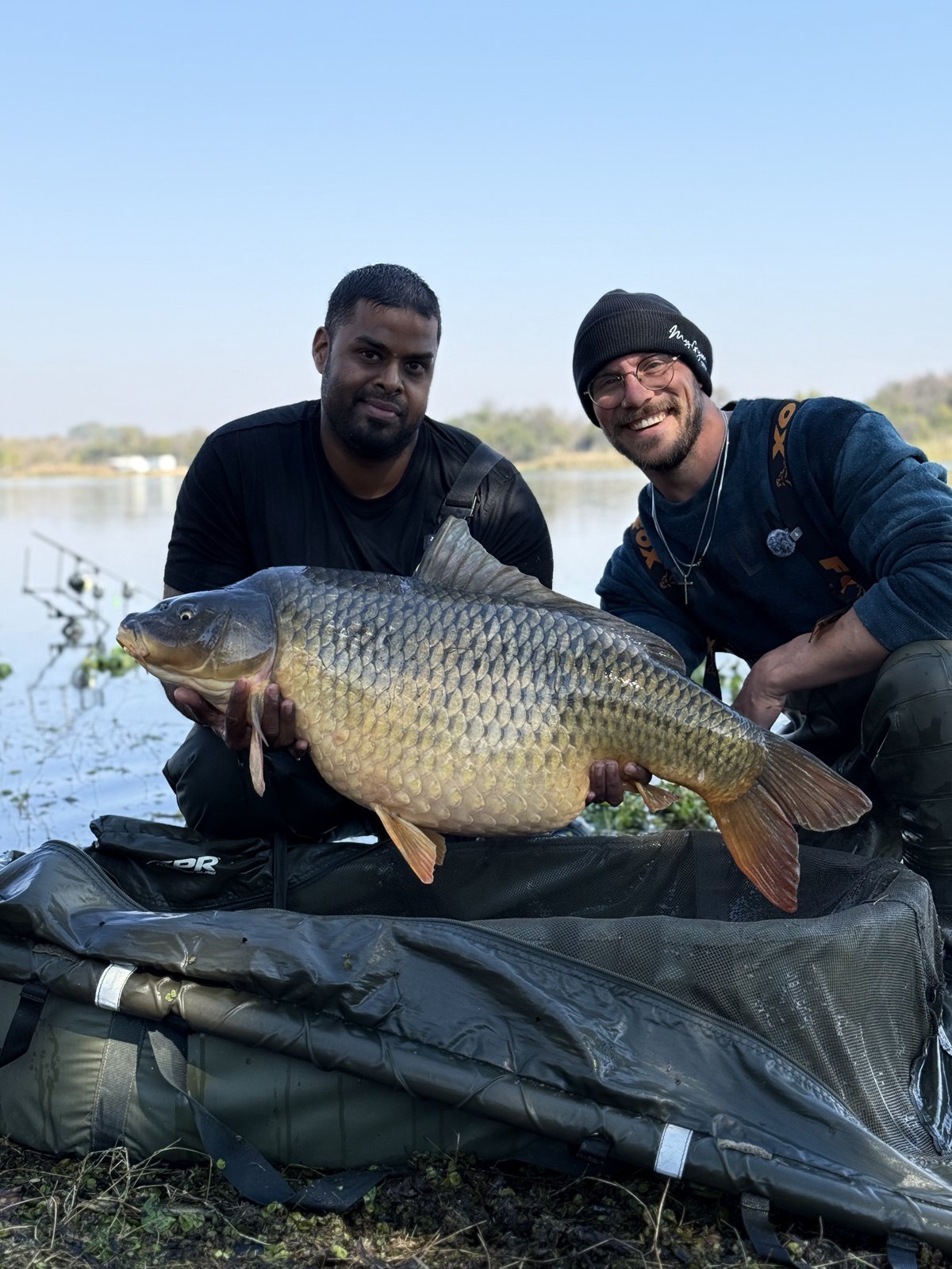 Avinesh and Juan with the personal best carp at Roodekoppies